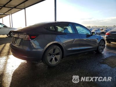 Trzecie zdjęcie samochodu z tyłu: 2022 TESLA MODEL 3 VIN:5YJ3E1EA0NF371254 - miniatura