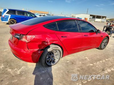 Trzecie zdjęcie samochodu z tyłu: 2022 TESLA MODEL 3 VIN:5YJ3E1EA3NF361575 - miniatura