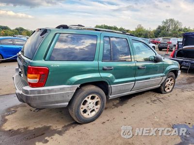 Trzecie zdjęcie samochodu z tyłu: 1999 JEEP GRAND CHEROKEE LAREDO VIN:1J4GW58S1XC680154 - miniatura