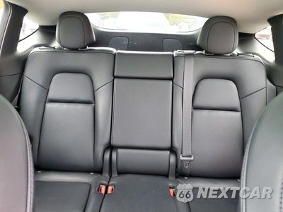 Zdjęcie 10 z 13 samochodu: 2022 TESLA MODEL Y VIN:7SAYGAEE9NF506401 - miniatura