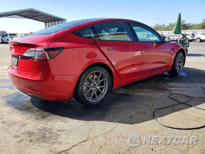 Trzecie zdjęcie samochodu z tyłu: 2022 TESLA MODEL 3 VIN:5YJ3E1EA8NF289708 - miniatura