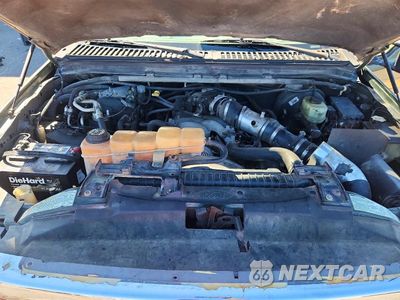 Zdjęcie 12 z 13 samochodu: 2000 FORD EXCURSION LIMITED VIN:1FMNU42S4YED18035 - miniatura