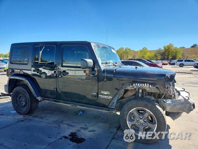 Czwarte zdjęcie samochodu z boku: 2014 JEEP WRANGLER UNLIMITED SAHARA VIN:1C4BJWEG4EL247719 - miniatura