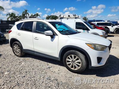 Czwarte zdjęcie samochodu z boku: 2015 MAZDA CX-5 TOURING VIN:JM3KE2CY8F0519840 - miniatura