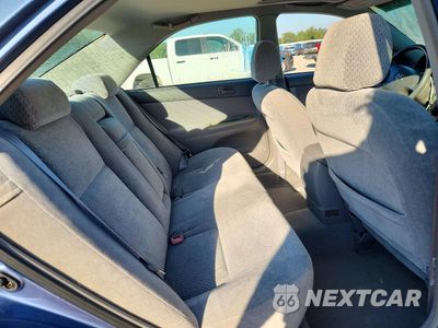 Zdjęcie 10 z 12 samochodu: 2003 TOYOTA CAMRY LE VIN:4T1BE32K13U708812 - miniatura