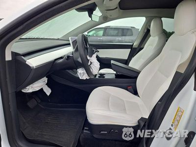 Zdjęcie 7 z 14 samochodu: 2022 TESLA MODEL Y VIN:7SAYGDEE7NF427276 - miniatura