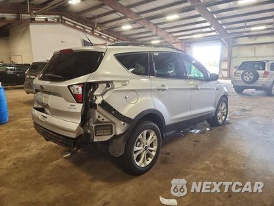 Trzecie zdjęcie samochodu z tyłu: 2017 FORD ESCAPE SE VIN:1FMCU0GDXHUD13891 - miniatura