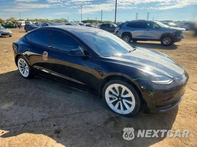 Czwarte zdjęcie samochodu z boku: 2021 TESLA MODEL 3 VIN:5YJ3E1EB6MF924559 - miniatura