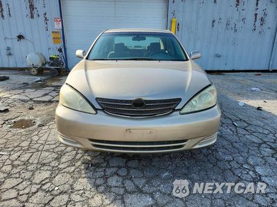 Piąte zdjęcie samochodu w środku: 2002 TOYOTA CAMRY LE VIN:4T1BE32KX2U047568 - miniatura