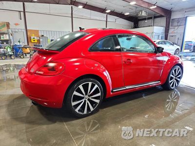 Trzecie zdjęcie samochodu z tyłu: 2013 VOLKSWAGEN BEETLE TURBO VIN:3VWV67AT1DM613573 - miniatura