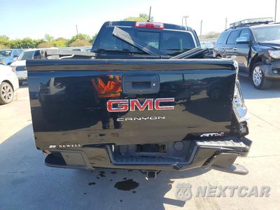 Zdjęcie 6 z 12 samochodu: 2021 GMC CANYON AT4 VIN:1GTG6FEN0M1100068 - miniatura