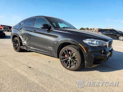 Czwarte zdjęcie samochodu z boku: 2019 BMW X6 XDRIVE50I VIN:5UXKU6C54KLP60455 - miniatura