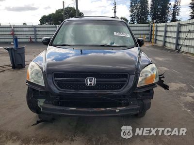 Piąte zdjęcie samochodu w środku: 2004 HONDA PILOT EX VIN:5FNYF18424B002788 - miniatura