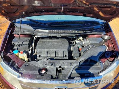 Zdjęcie 12 z 14 samochodu: 2012 HONDA ODYSSEY TOURING VIN:5FNRL5H90CB061448 - miniatura