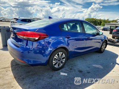 Trzecie zdjęcie samochodu z tyłu: 2017 KIA FORTE LX VIN:3KPFL4A75HE133621 - miniatura