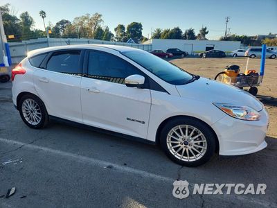 Czwarte zdjęcie samochodu z boku: 2014 FORD FOCUS BEV VIN:1FADP3R45EL300441 - miniatura