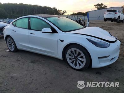 Czwarte zdjęcie samochodu z boku: 2023 TESLA MODEL 3 VIN:5YJ3E1EA9PF447492 - miniatura
