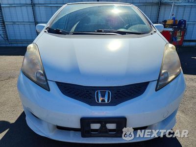 Piąte zdjęcie samochodu w środku: 2010 HONDA FIT SPORT VIN:JHMGE8H44AC030431 - miniatura