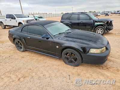 Czwarte zdjęcie samochodu z boku: 2004 FORD MUSTANG VIN:1FAFP406X4F190819 - miniatura