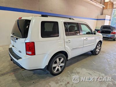 Trzecie zdjęcie samochodu z tyłu: 2015 HONDA PILOT TOURING VIN:5FNYF4H9XFB072023 - miniatura