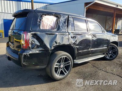 Trzecie zdjęcie samochodu z tyłu: 2019 GMC YUKON SLE VIN:1GKS2AKC9KR296879 - miniatura
