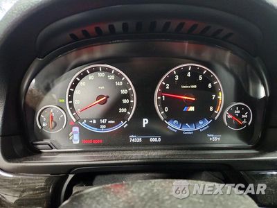 Zdjęcie 9 z 13 samochodu: 2013 BMW M5 VIN:WBSFV9C56DD095727 - miniatura