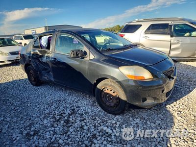 Czwarte zdjęcie samochodu z boku: 2009 TOYOTA YARIS BASE VIN:JTDBT903491341763 - miniatura