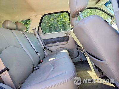 Zdjęcie 11 z 13 samochodu: 2009 MERCURY MARINER PREMIER VIN:4M2CU97G49KJ17360 - miniatura