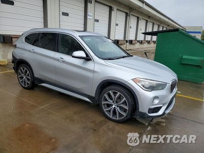 Czwarte zdjęcie samochodu z boku: 2018 BMW X1 SDRIVE28I VIN:WBXHU7C32J3F04657 - miniatura