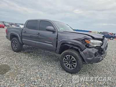 Czwarte zdjęcie samochodu z boku: 2021 TOYOTA TACOMA SR5 V6 VIN:3TMAZ5CNXMM149906 - miniatura