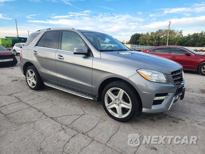Czwarte zdjęcie samochodu z boku: 2015 MERCEDES-BENZ ML 400 4MATIC VIN:4JGDA5GB8FA441828 - miniatura