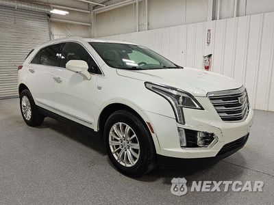 Czwarte zdjęcie samochodu z boku: 2019 CADILLAC XT5 VIN:1GYKNARS2KZ117673 - miniatura