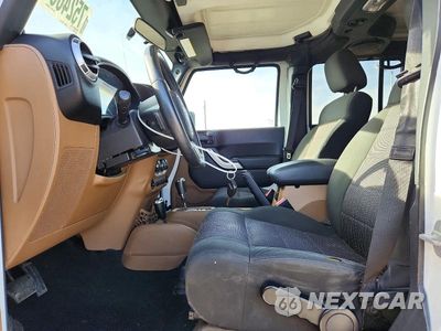Zdjęcie 7 z 13 samochodu: 2012 JEEP WRANGLER UNLIMITED SAHARA VIN:1C4BJWEG6CL205341 - miniatura