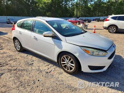 Czwarte zdjęcie samochodu z boku: 2015 FORD FOCUS SE VIN:1FADP3K23FL270656 - miniatura