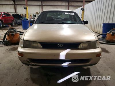 Piąte zdjęcie samochodu w środku: 1995 TOYOTA COROLLA DX VIN:2T1AE09BXSC108807 - miniatura