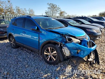 Czwarte zdjęcie samochodu z boku: 2018 TOYOTA RAV4 XLE VIN:JTMWFREV9JD132122 - miniatura