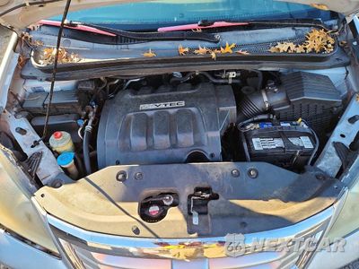 Zdjęcie 12 z 14 samochodu: 2010 HONDA ODYSSEY EX VIN:5FNRL3H46AB062027 - miniatura