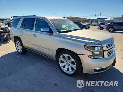 Czwarte zdjęcie samochodu z boku: 2015 CHEVROLET TAHOE C1500 LTZ VIN:1GNSCCKC4FR254136 - miniatura