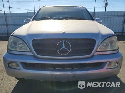 Piąte zdjęcie samochodu w środku: 2002 MERCEDES-BENZ ML 320 VIN:4JGAB54EX2A314135 - miniatura