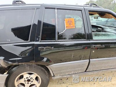 Zdjęcie 11 z 13 samochodu: 1997 JEEP GRAND CHEROKEE LAREDO VIN:1J4FX58S7VC724129 - miniatura