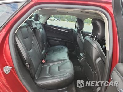 Zdjęcie 10 z 12 samochodu: 2014 FORD FUSION TITANIUM VIN:3FA6P0K97ER146247 - miniatura