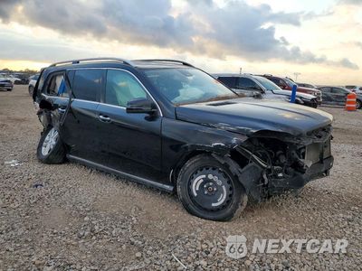 Czwarte zdjęcie samochodu z boku: 2016 MERCEDES-BENZ GL 450 4MATIC VIN:4JGDF6EE3GA697543 - miniatura