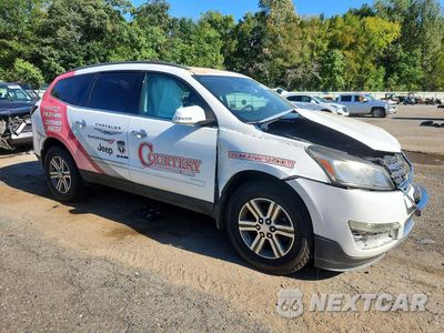 Czwarte zdjęcie samochodu z boku: 2016 CHEVROLET TRAVERSE LT VIN:1GNKRHKD2GJ173379 - miniatura