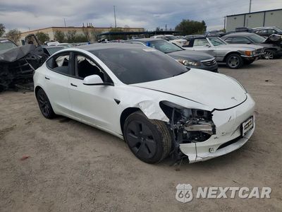 Czwarte zdjęcie samochodu z boku: 2023 TESLA MODEL 3 VIN:5YJ3E1EAXPF544331 - miniatura