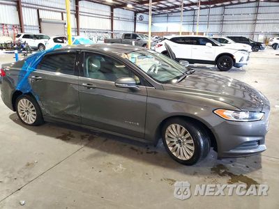 Czwarte zdjęcie samochodu z boku: 2016 FORD FUSION SE HYBRID VIN:3FA6P0LU3GR264804 - miniatura