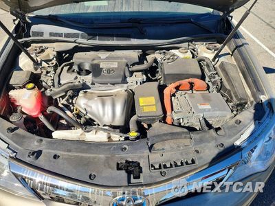 Zdjęcie 11 z 12 samochodu: 2014 TOYOTA CAMRY HYBRID XLE VIN:4T1BD1FK4EU140317 - miniatura