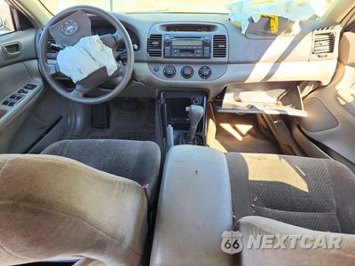 Zdjęcie 8 z 12 samochodu: 2004 TOYOTA CAMRY LE VIN:JTDBE32K240301529 - miniatura