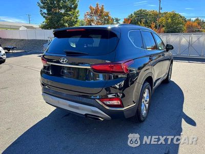 Trzecie zdjęcie samochodu z tyłu: 2019 HYUNDAI SANTA FE SE VIN:5NMS2CAD2KH112372 - miniatura