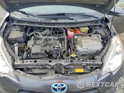 Zdjęcie 12 z 13 samochodu: 2014 TOYOTA PRIUS C TWO VIN:JTDKDTB37E1569466 - miniatura