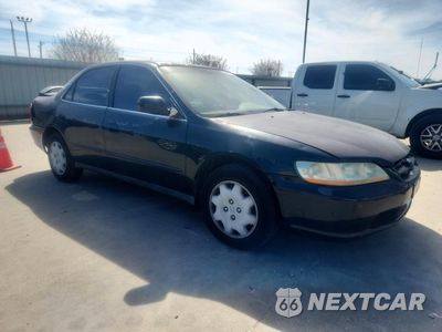 Czwarte zdjęcie samochodu z boku: 1999 HONDA ACCORD LX VIN:JHMCG5642XC034013 - miniatura